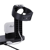 Black smartwatch charging stand with Apple Watch on a white background